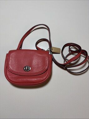 Compact coral pebbled Leather Crossbody Bag with Turn-Lock Closure